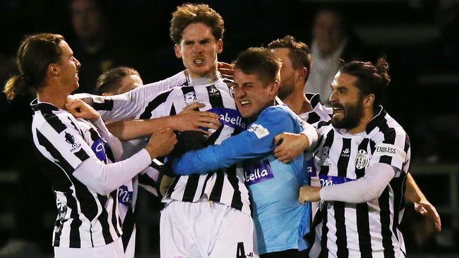 Tremayne Sadler celebrates his goal for Moreland Zebras.