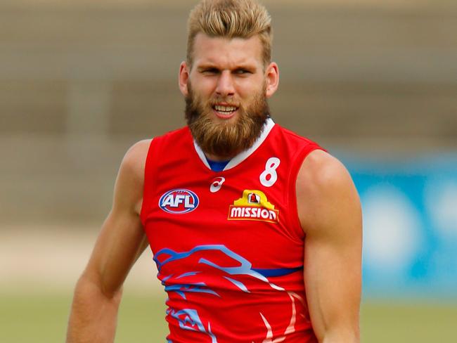 MELBOURNE, AUSTRALIA - MARCH 27:  Jackson Trengove handballs during a Western Bulldogs AFL training session at Whitten Oval  on March 27, 2018 in Melbourne, Australia.  (Photo by Darrian Traynor/Getty Images)