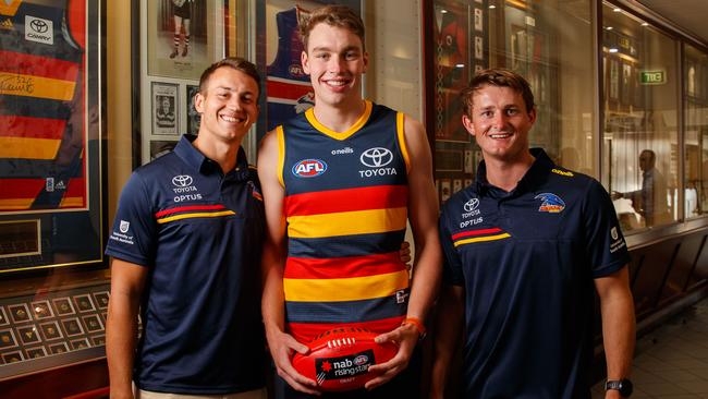 Riley Thilthorpe, with Tom Doedee and Matt Crouch, after becoming a Crow in last year’s draft. Picture: Matt Turner