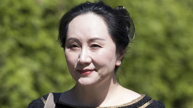 Meng Wanzhou, chief financial officer of Huawei, leaves her home to go to the Supreme Court in Vancouver, Canada, on Thursday. Picture: AP