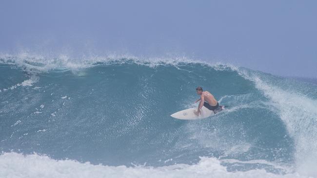 Surfers enjoying the larger swell at Snapper Rocks on Sunday 2 January 2022. Picture: Jerad Williams