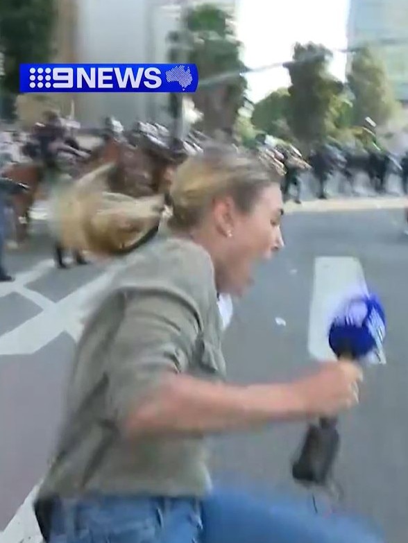 Lauren Tomasi reacts to being shot. Pictures: Channel 9