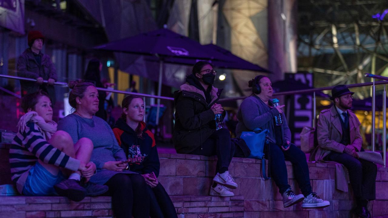 Melbourne, Australia: Aussies, young and old, watch the funeral service of Queen Elizabeth II at Federation Square. Picture: Getty Images