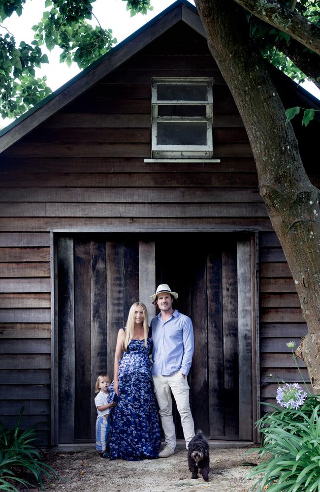 Dinnigan at her property in Milton with husband Bradley Cocks and son Hunter.