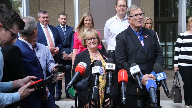 Greg Simms with wife Merilyn and their daughter Renee speak to media outside court after Chris Dawson’s sentence for Lyn’s murder is handed down. Picture: Britta Campion