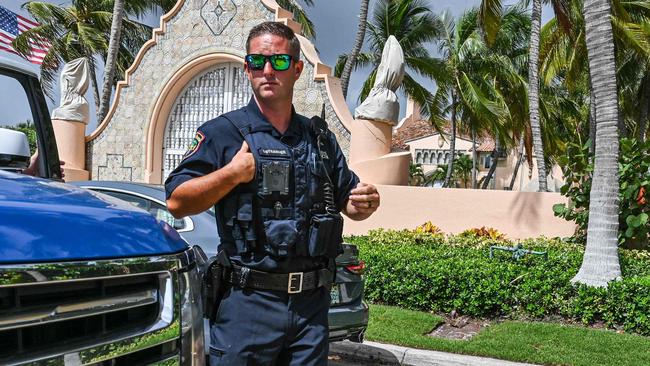 A local police officer in front of Mar-a-Lago. Picture: Giorgio Viera/AFP