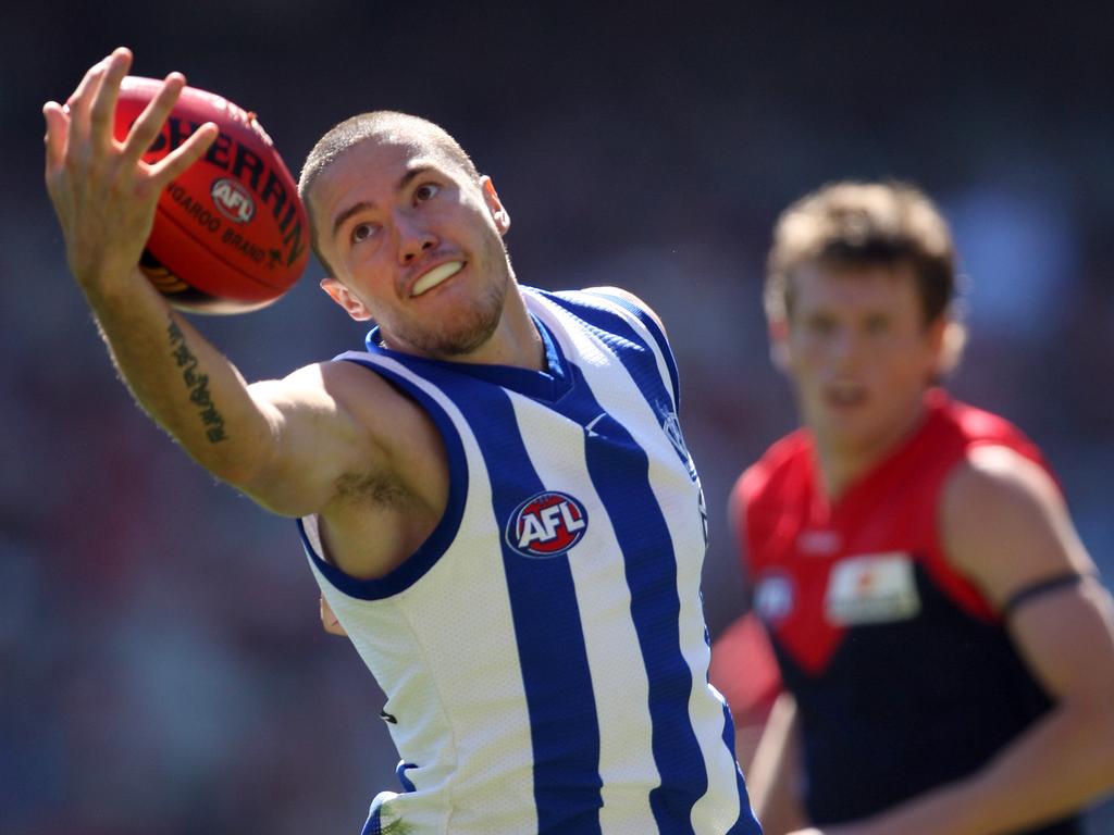 Gavin Urquhart takes a mark for North Melbourne.