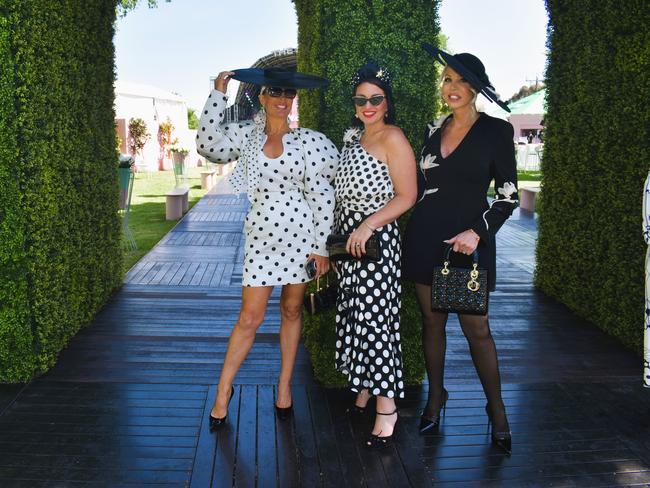 Guests in striking racewear at Penfolds Derby Day at the Flemington Racecourse on Saturday, November 02, 2024: Amanda Smith, Andrea Cainero and Kathryn Lee. Picture: Jack Colantuono