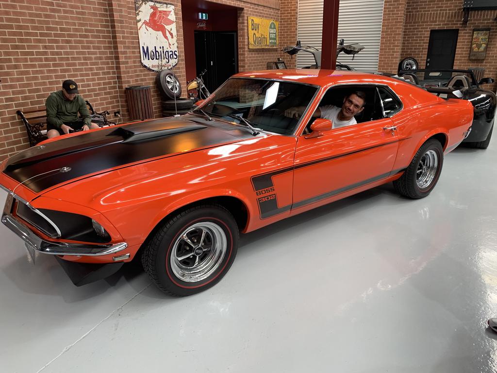 Tim Tszyu has sold his 1955 Chevy in preparation of the move. An avid class car collector, here he is in a Ford Mustang BOSS 302. Picture: Supplied