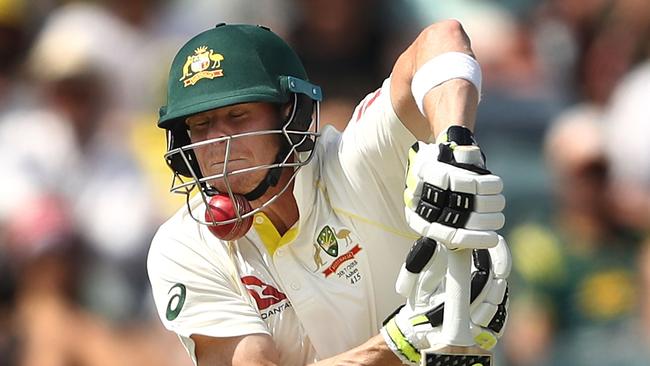 Steve Smith is struck by a delivery from Craig Overton. Photo: Getty Images