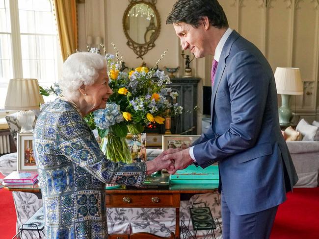 The Queen shakes hands with Canadian Prime Minister Justin Trudeau. Picture: Steve Parsons/Pool/AFP