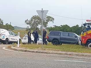 Police at the scene of the siege outside Bowen on April 23.