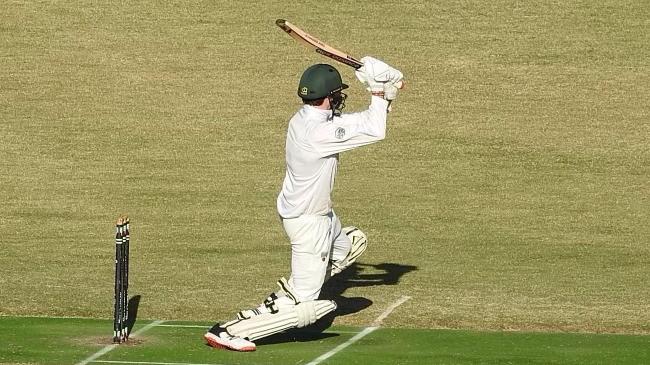 Lachlan McLeod hits a boundary from the final delivery for North Eltham Wanderers. Picture: Janet Lyall