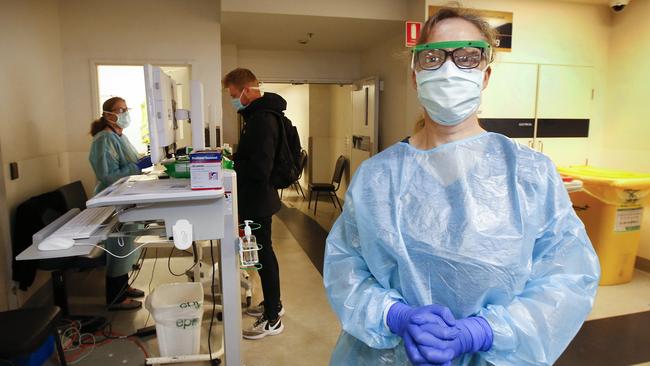 Royal Melbourne Hospital COVID-19 screening clinic ED nurse Robyn Lindsay, has seen the numbers of people fronting for testing come down today. Picture: David Caird