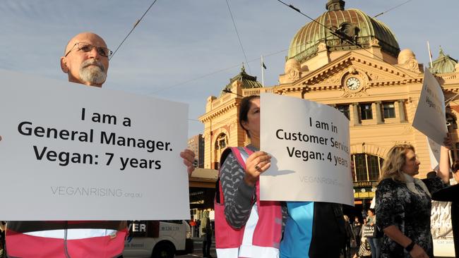 Vegan protesters block the intersection of Flinders and Swanston Street Melbourne in support of animal rights. Picture: Andrew Henshaw