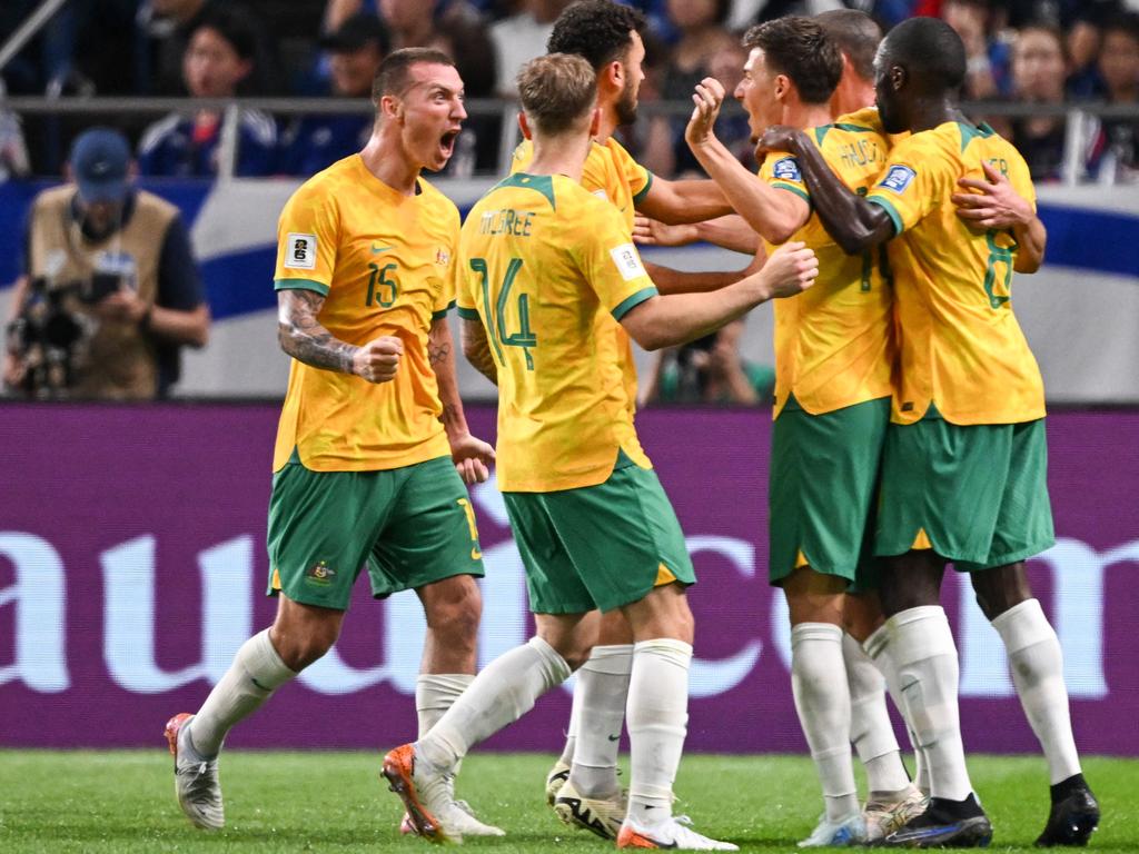 Australia's players after Japan scored an own goal. Picture: AFP