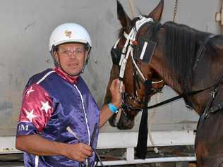 Warwick driver Dayl March wins the first harness race at the Warwick Showgrounds for 17 years with Clifton horse Couldntnokhimbak. Picture: Gerard Walsh