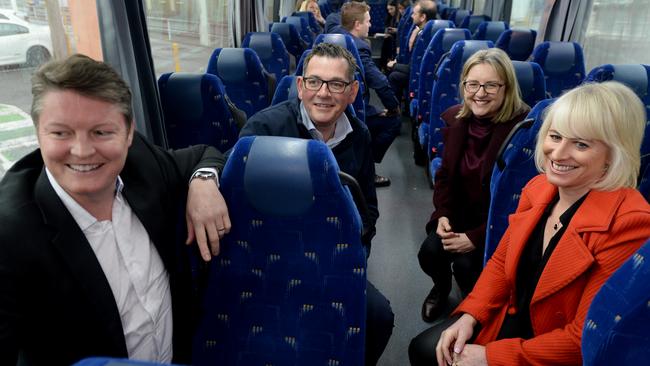 Victorian Premier Daniel Andrews, Deputy Premier Jacinta Allan, Ben Carroll, Minister for Public Transport, and Catherine Andrews on the campaign bus. Picture: NCA NewsWire / Andrew Henshaw