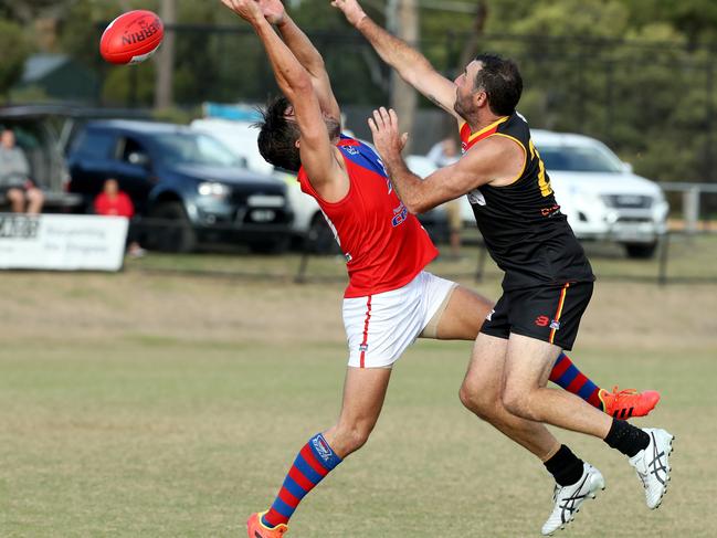 The seasoned Daniel Campisano (right), playing here for Dingley, is a now a Vampire.