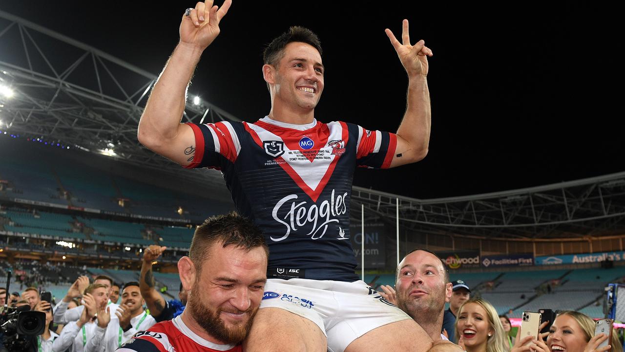 Cooper Cronk of the Roosters is chaired off following their win over the Raiders in the 2019 NRL Grand Final