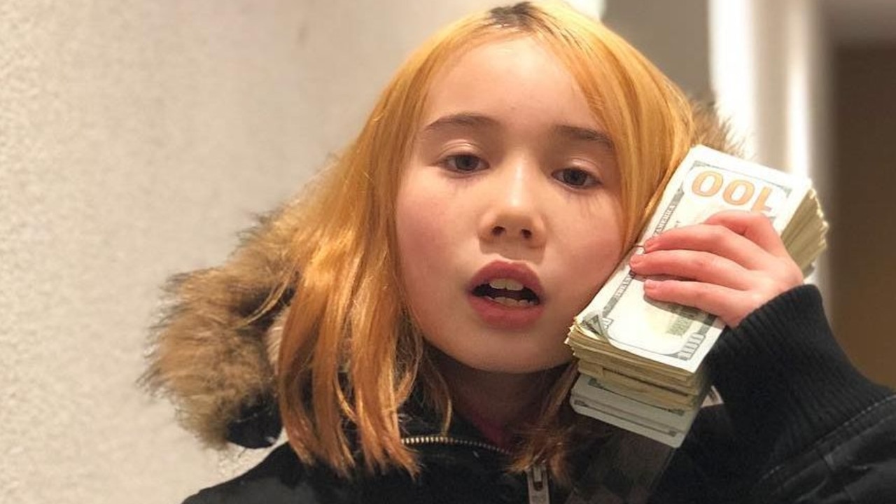 Lil Tay loved posing with stacks of cash.