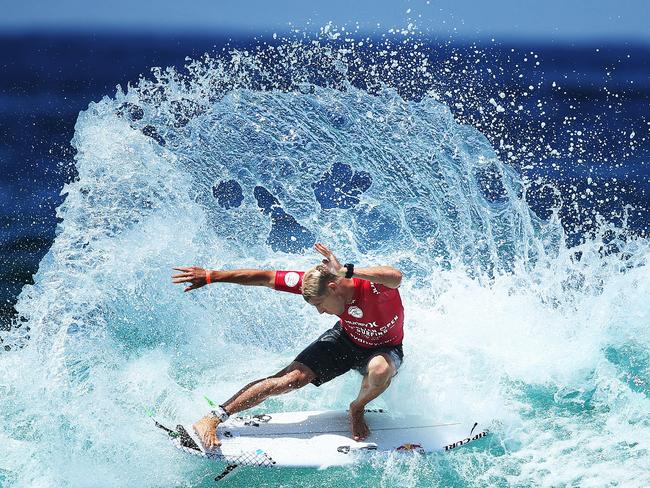 Legendary Australian surfer Mick Fanning shows his style during round 2 of the Australian Open of Surfing at Manly Beach. Picture. Phil Hillyard