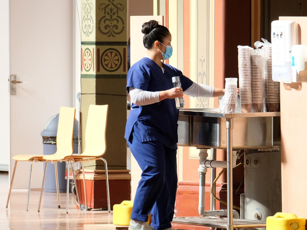 Nursing staff at the mass vaccination hub at the Royal Exhibition Building in Melbourne. Picture: AAP Image Pool / Luis Ascui via NCA NewsWire