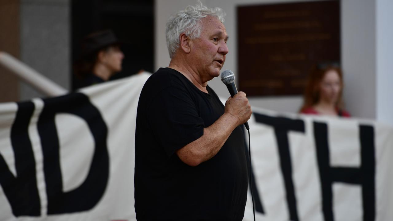 Amnesty International Australia Indigenous Advisor Rodney Dillon speaks outside the NT Parliament on Wednesday during a vigil for Kumanjayi White, a 24-year-old Warlpiri man with a disability who died after being restrained by police in the Alice Springs Coles. Picture: Zizi Averill