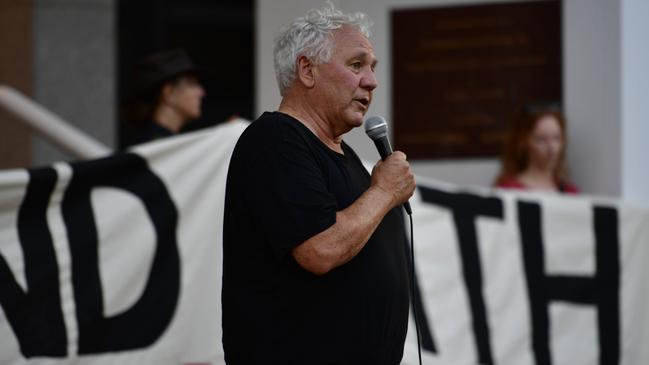 Amnesty International Australia Indigenous Advisor Rodney Dillon speaks outside the NT Parliament on Wednesday during a vigil for Kumanjayi White, a 24-year-old Warlpiri man with a disability who died after being restrained by police in the Alice Springs Coles. Picture: Zizi Averill