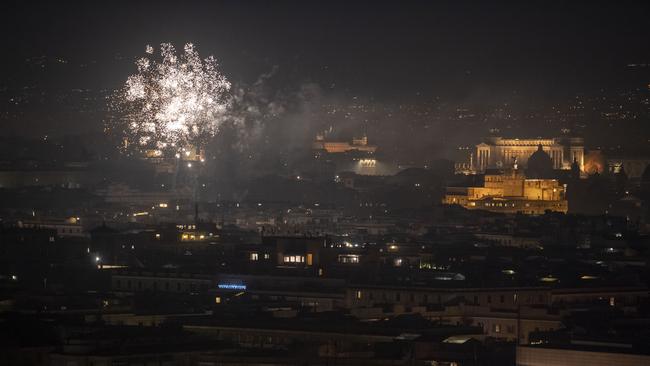 Fireworks are seen over the city of Rome while people celebrate New Year's Eve during the Coronavirus pandemic. Picture: Getty