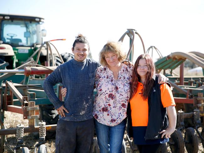 Worker on David’s farm, Camilo Velasquez from Colombia, with Jenny Moore and Dom Matthews. Picture: Chloe Smith