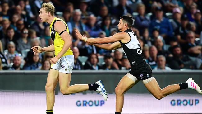 Ryan Burton gets Tom Lynch in the back resulting in a double goal for the Tigers. Picture: Mark Brake (Getty)