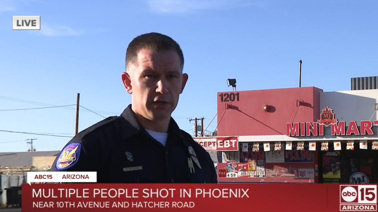 Phoenix police Sgt. Andy Williams speaking from outside the strip shops where a 14-year-old was fatally shot and eight other were injured. Picture: ABC Arizona