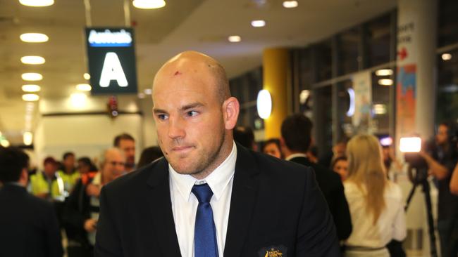 Wallabies captain Stephen Moore arrives back in Sydney from the Rugby World Cup.