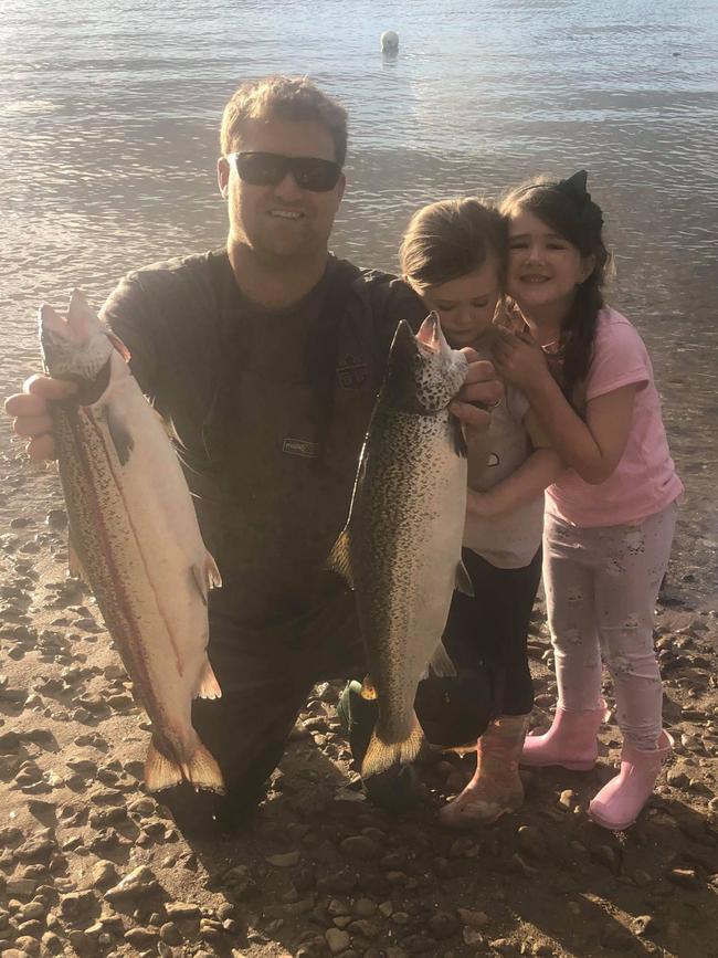 James Robinson, along with his daughters Alira and Callie, caught these great Atlantic Salmon in Deep Bay, Cygnet. Photo: Supplied