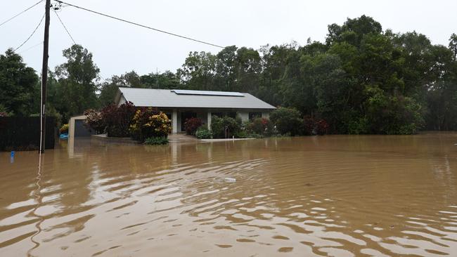 Ted Fay and Pam Fay's Clitheroe Street home was inundated by flood water on Sunday night and left covered in mud. Picture: Brendan Radke