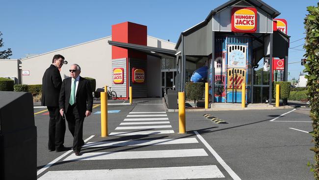 Lawyers at a site viewing at Hungry Jacks on Ipswich Rd at Annerley. Picture: Liam Kidston.