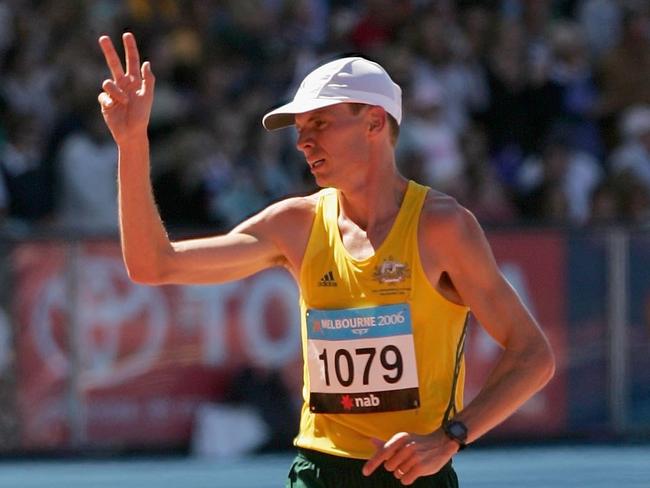 MELBOURNE, AUSTRALIA - MARCH 19: Scott Westcott of Australia competes in the final of the men's marathon at the athletics during day four of the Melbourne 2006 Commonwealth Games at the Melbourne Cricket Ground on March 19, 2006 in Melbourne, Australia. Samson Ramadhani Nyoni of Tanzania won gold, Fred Mogaka Tumbo of Kenya won silver and Daniel Robertson of England won bronze. (Photo by Mark Dadswell/Getty Images)