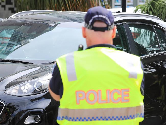 30th November 2020, - Queensland Police stop and check vehicles entering into Queensland at the Griffith Street Border crossing on the last day of Covid 19 restrictions in QueenslandPhoto: Scott Powick Newscorp