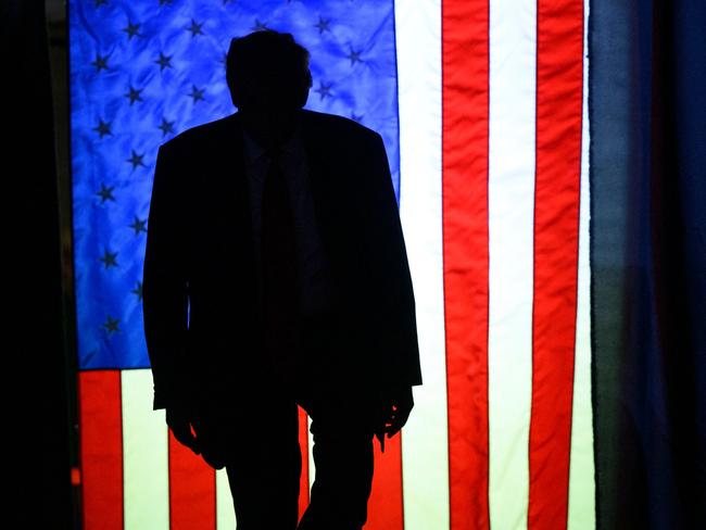 ERIE, PENNSYLVANIA - JULY 29: Former U.S. President Donald Trump enters Erie Insurance Arena for a political rally while campaigning for the GOP nomination in the 2024 election on July 29, 2023 in Erie, Pennsylvania.   Jeff Swensen/Getty Images/AFP (Photo by JEFF SWENSEN / GETTY IMAGES NORTH AMERICA / Getty Images via AFP)