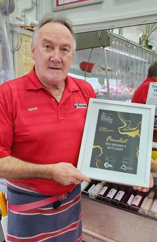 Kevin Brown holding his finalist award for 2022 Best In Business. Picture: Aden Stokes