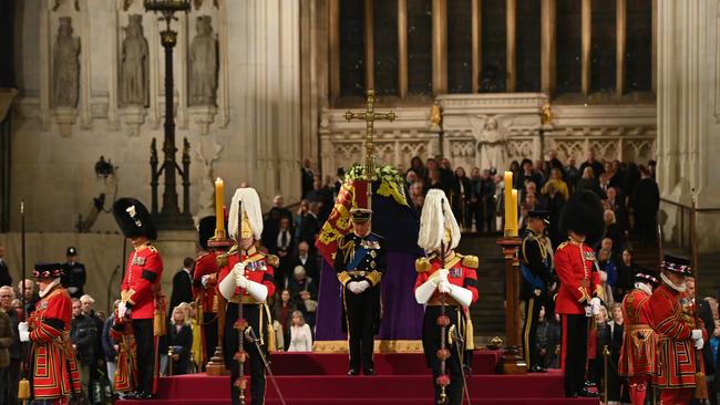 King Charles III, Anne, Princess Royal, Prince Andrew, Duke of York and Prince Edward, Earl of Wessex hold a vigil beside the coffin of their mother, Queen Elizabeth II, as it lies in state on the catafalque in Westminster Hall, at the Palace of Westminster, ahead of her funeral on Monday, on September 16, 2022 in London, England. (Photo Eddie Mulholland – WPA Pool/Getty Images)