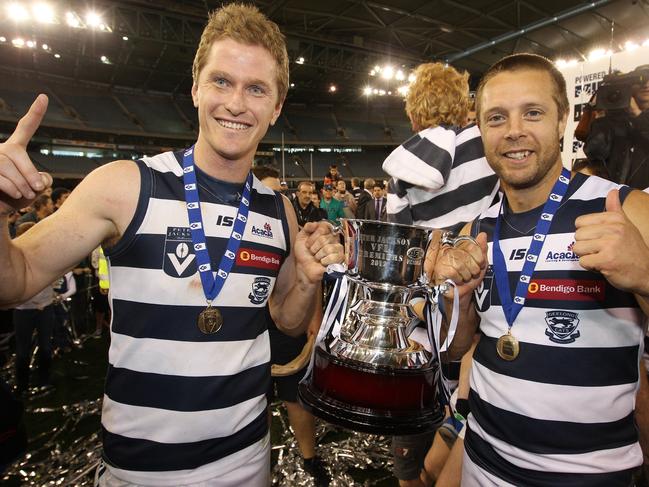 Troy Selwood and David Wojcinski after Geelong’s VFL premiership victory.