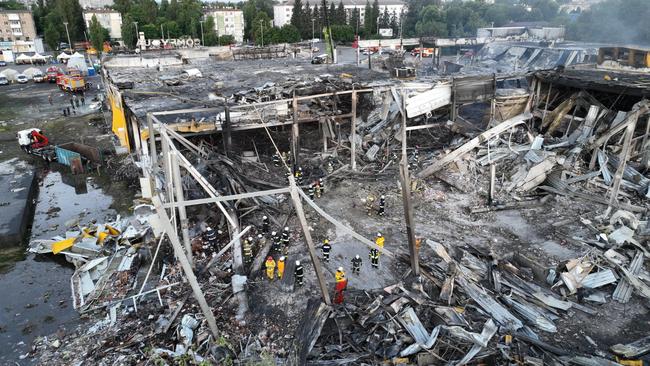 The wreckage of a mall in Kremenchuk, the day after it was hit by a Russian missile strike. Picture: AFP