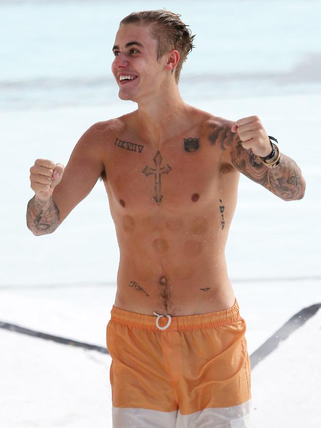 Justin Bieber spotted swimming at Bondi Iceberg in Sydney. Picture: KHAPGG/Matrix