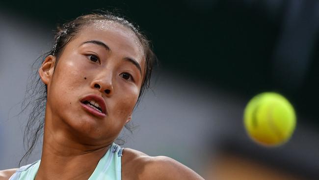 China's Zheng Qinwen was battling more than just her opponent. Photo by JULIEN DE ROSA / AFP