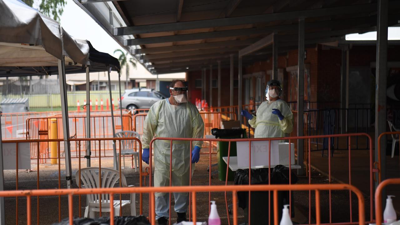 Staff rotate in 30 minute shifts at Katherine East testing clinic as temperatures and humidity climb. Picture: Amanda Parkinson