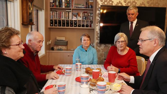 Scott Morrison and Ken Wyatt talk to recipients of in-home care. Picture: Kym Smith.