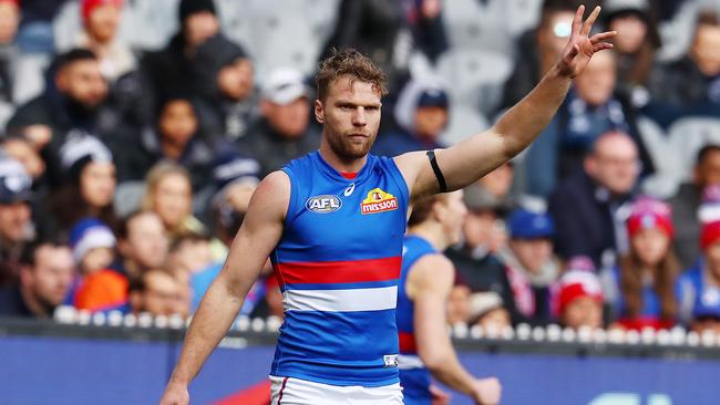 Jake Stringer signals to the bench after injuring his left hamstring. Picture: Michael Klein