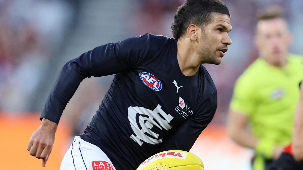 Sam Petrevski-Seton handballs against Essendon at the MCG. Picture: Michael Klein